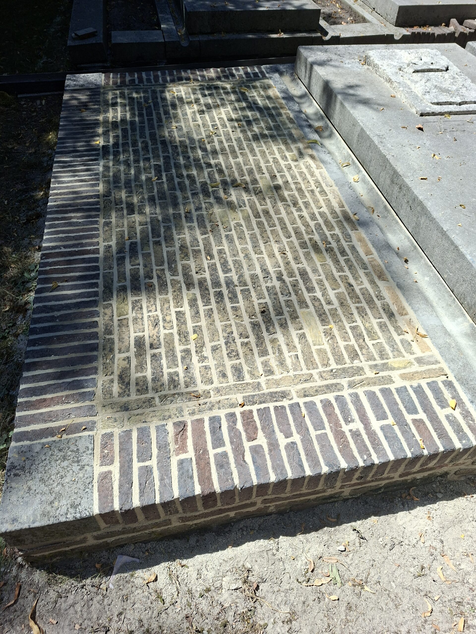 Restauratie graf begraafplaats
